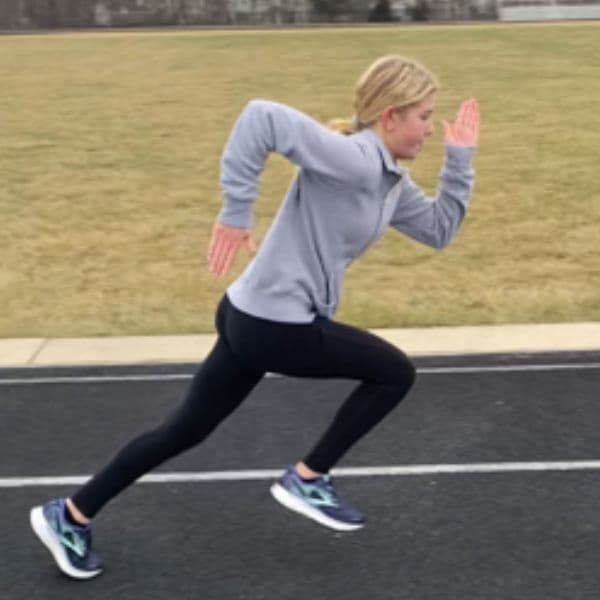 RFP sprinter Lauren mid-stride during a track race